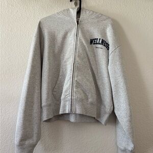 Sporty and Rich Gray Zip-Up Hoodie with Wellness Print
